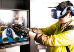 VR user in Automotive VR application. Photo by XR Expo on Unsplash.